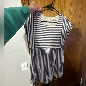 Boutique style dress.  Has pockets. Size small. Never worn
